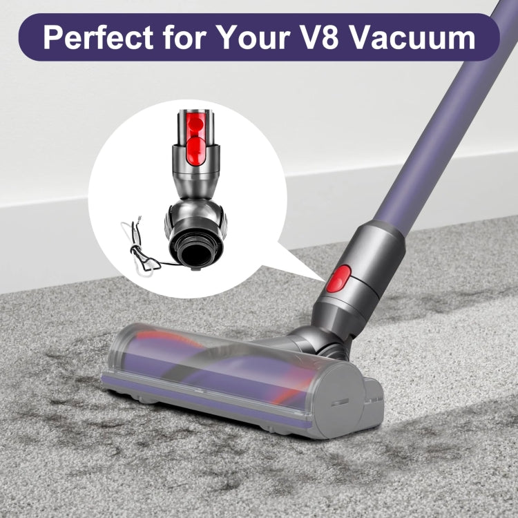 Vacuum floor head with purple brush roller and red accent on gray housing