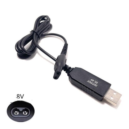 Black 8V USB-to-shaver charging cable with small barrel plug connector