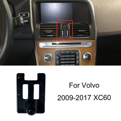 Volvo dashboard phone bracket base, black mount insert near hazard controls