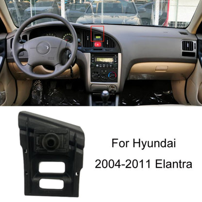 Black plastic mobile navigation bracket base with round suction pad and side cutouts