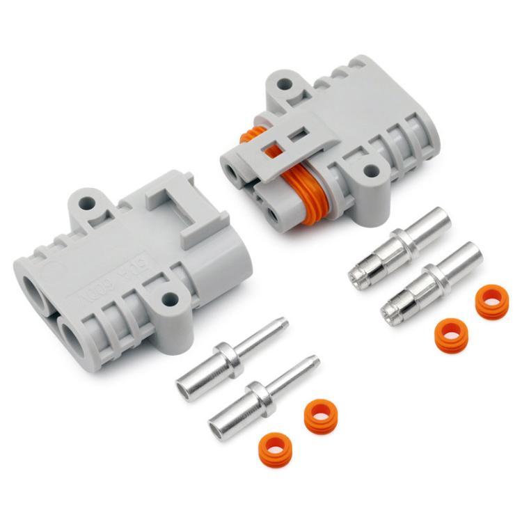 Automotive waterproof plug connector set with orange spool, metal pins, and rubber seals