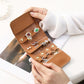 PU jewelry organizer wallet with open compartments for earrings and rings, tan-brown