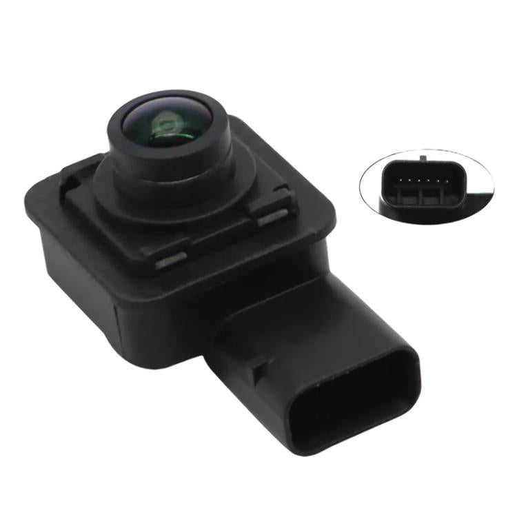 Black rear view camera sensor with circular lens and electrical connector end
