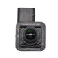 Square backup camera housing with centered lens and green-tinted glass