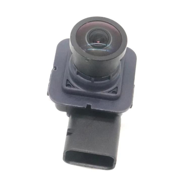 Rear view reversing camera module with circular lens and dark plastic housing