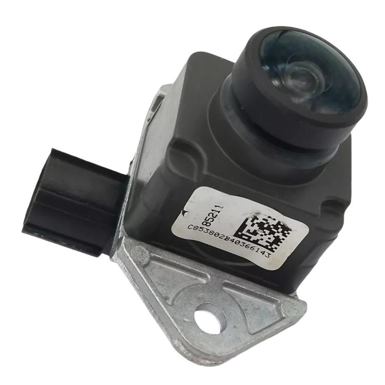 Rearview camera module with black lens, side connector, and metal mounting tabs