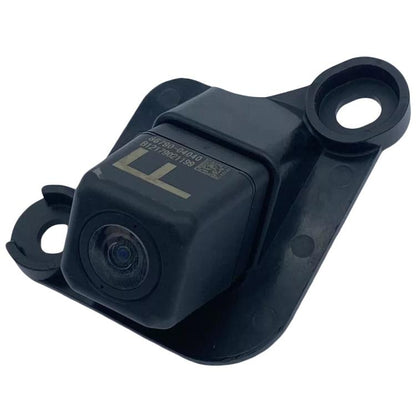 Rearview reversing camera module with black plastic housing and circular mounting holes
