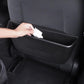 Car seat rear wet/dry storage box installed on back seat, hand placing tissue inside