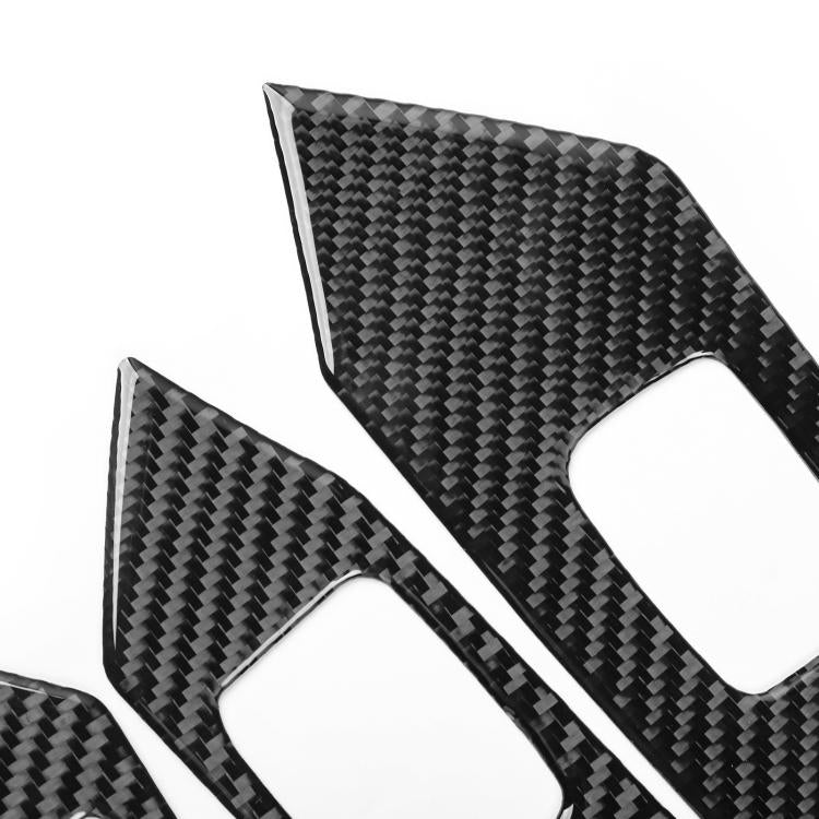 Close-up of black carbon-fiber lift panel decorative stickers with white backing