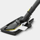 Carpet steamer nozzle on black glider base with white scrubbing pads