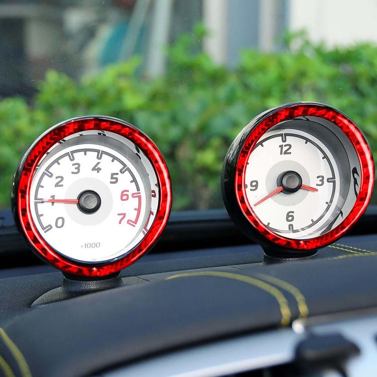 Two red dashboard gauge ring stickers on instrument dials