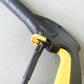 Yellow O-shape sealing ring on a gray high-pressure washer inlet connector