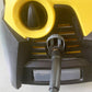 Pressure washer inlet area with yellow control housing and black sealing ring connector