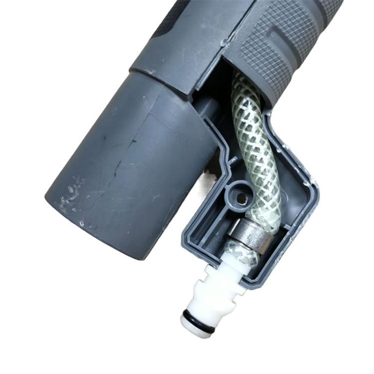 Gray handle connector assembly with white nozzle and metal mesh insert
