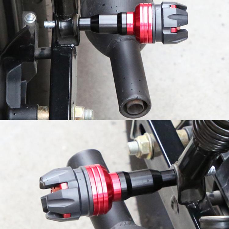Red anti-drop frame slider with black body and silver mounting bolt, mounted on motorcycle