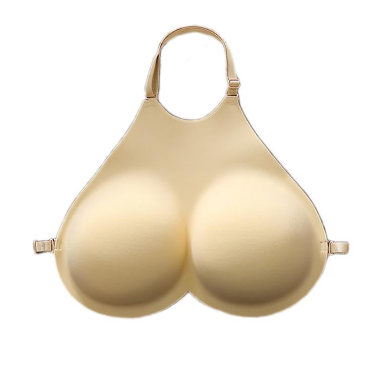 Beige fake breast pads with adjustable shoulder straps and side clasps