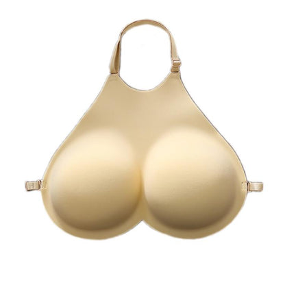 Beige fake breast pads with adjustable shoulder straps and side clasps