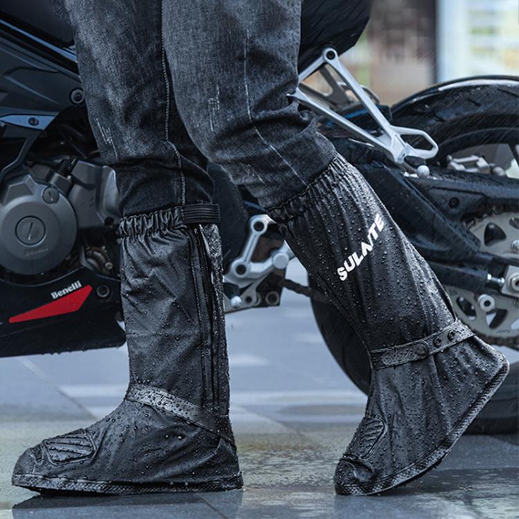 Black rain shoe covers with elastic top and textured anti-slip sole, on motorcycle