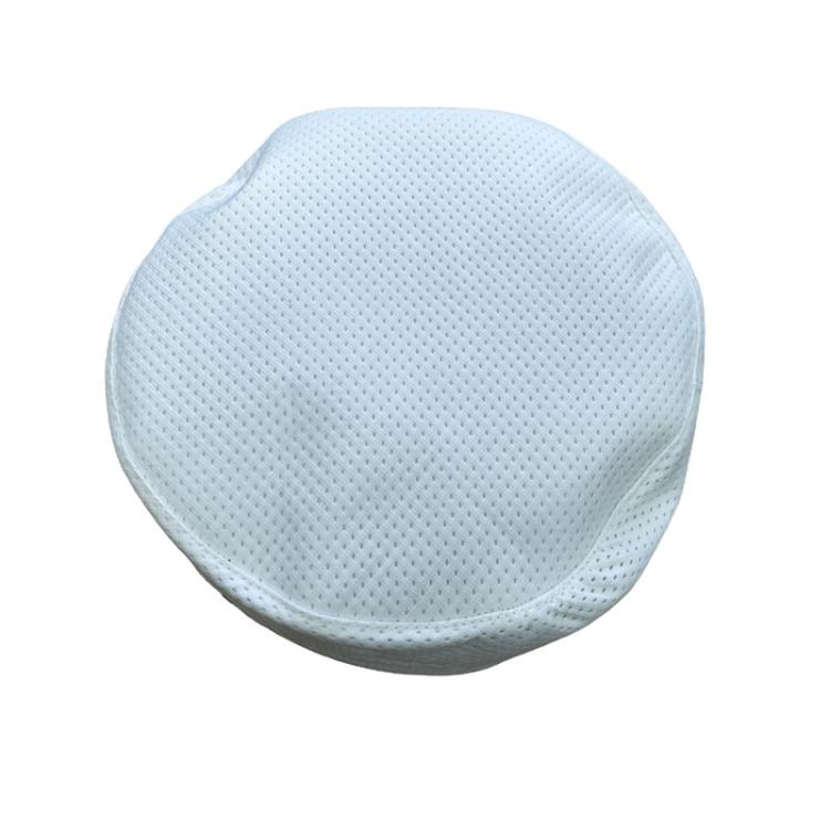 White circular vacuum filter media pad with fine textured surface