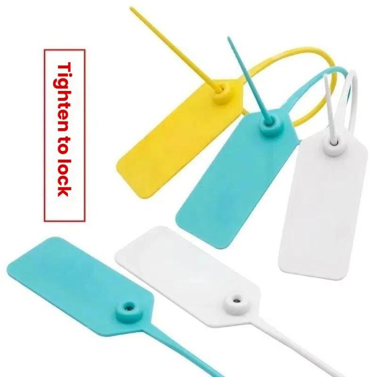 Plastic security seal tags in yellow teal and white, with tie cords and attachment holes