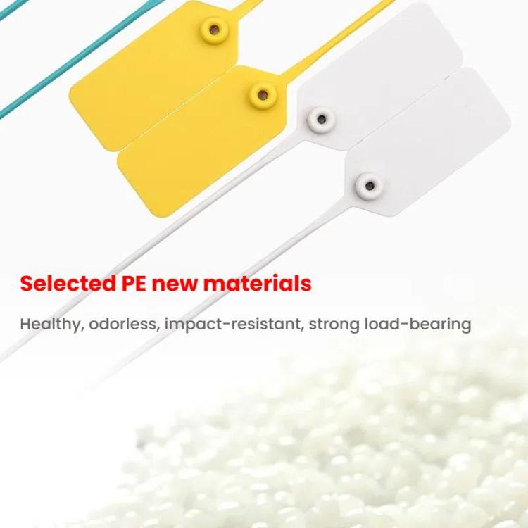 Close-up of plastic security seal tags in yellow, white, and teal with fastening holes
