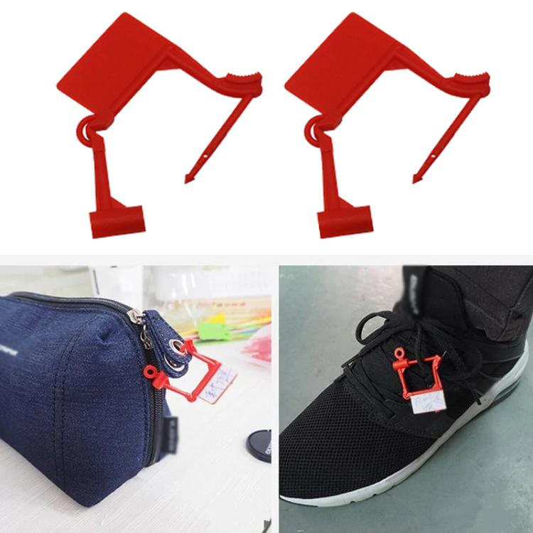 Red plastic security seal tags with locking loops for anti-theft packaging.
