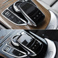 Black car multimedia control cover installed on center console with touch buttons