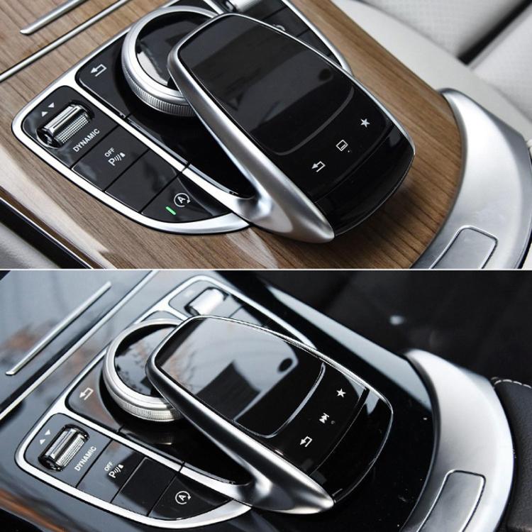 Black car multimedia control cover installed on center console with touch buttons