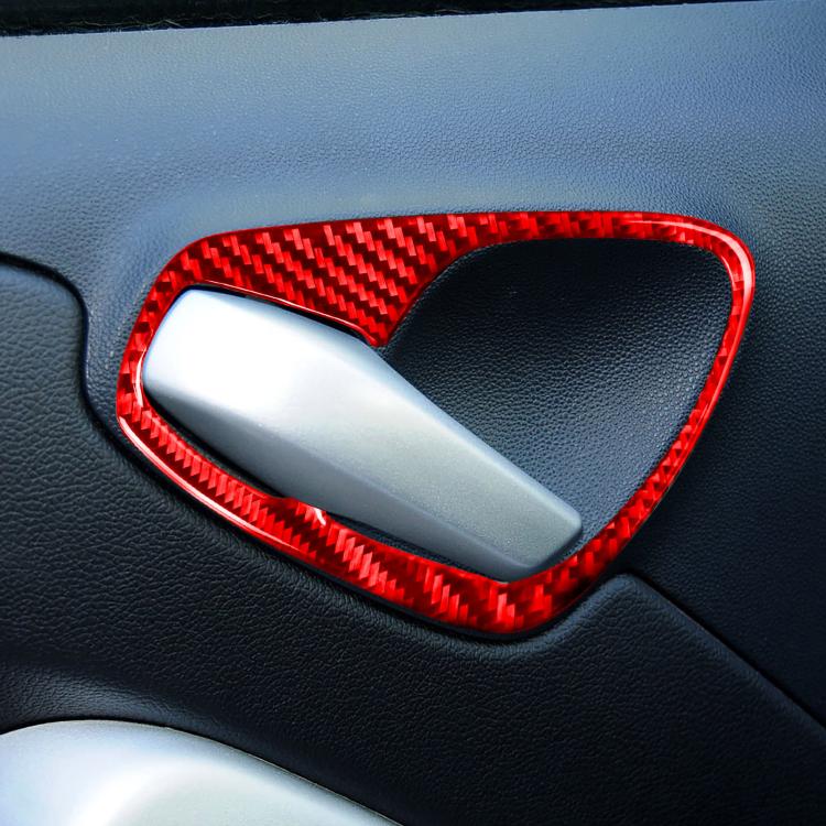 Red carbon-fiber door handle sticker trim with white insert on dark interior