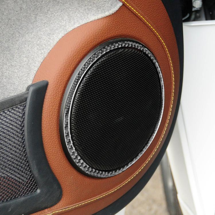 Door speaker trim ring sticker, black carbon-fiber style with silver edge