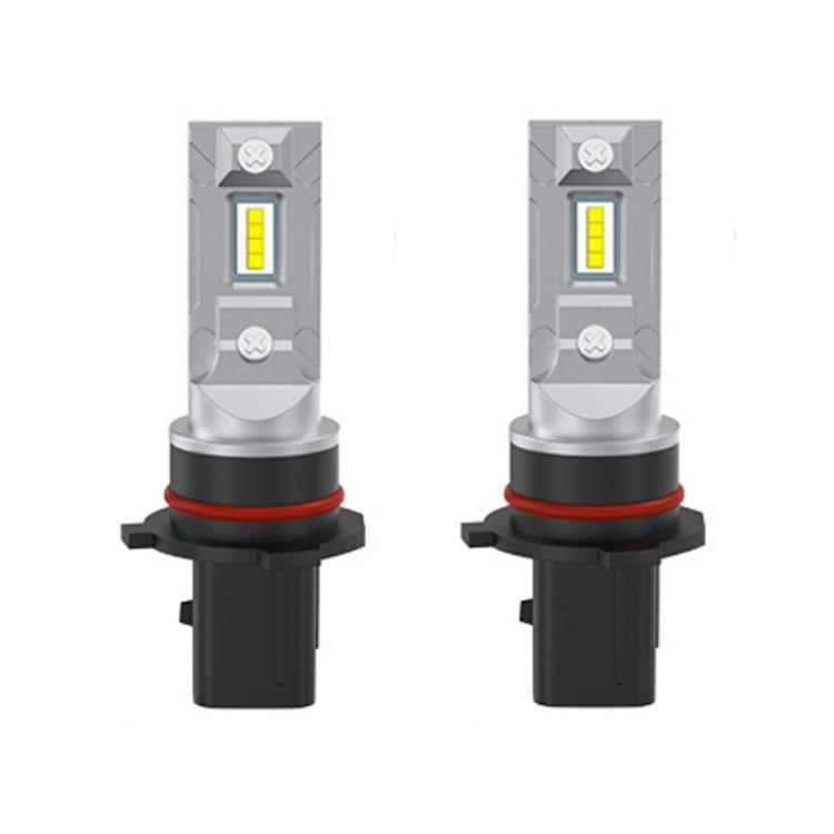 Pair of LED headlight bulbs with yellow chips, silver housings, and black plug bases