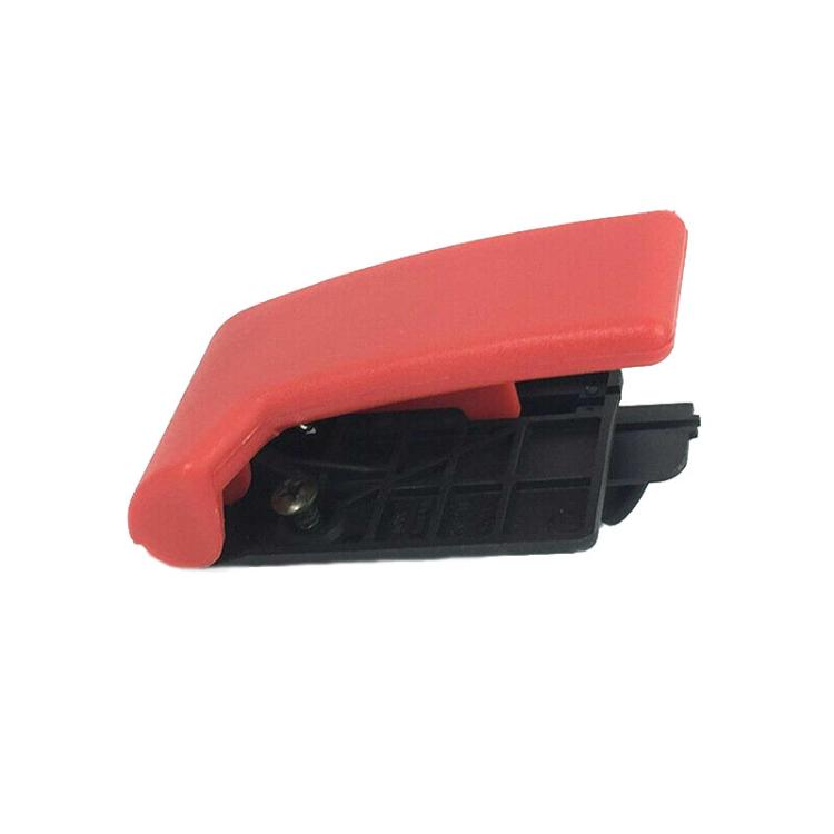 Red engine hood cover opener latch cover with black housing underside