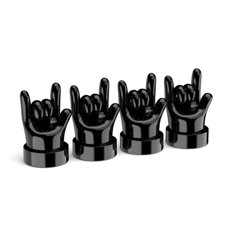 Set of 4 black hand-shaped tire valve caps with raised finger gestures