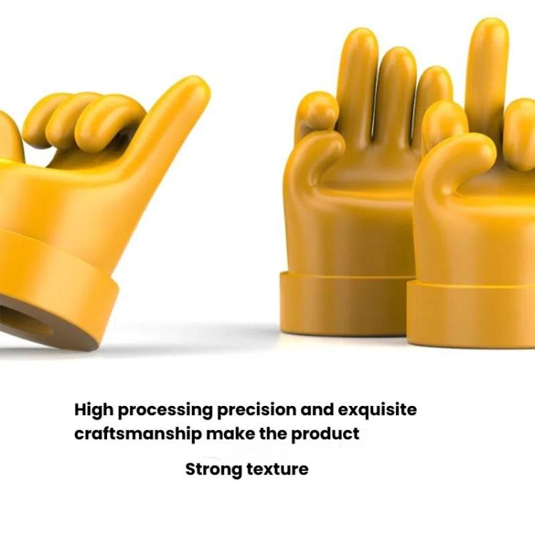 Yellow hand-gesture tire valve cap with detailed raised fingers