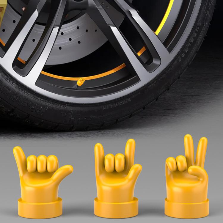 Yellow hand-gesture tire valve caps, three decorative caps