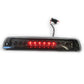 LED third brake light with red LEDs lit through smoked lens, high-mounted