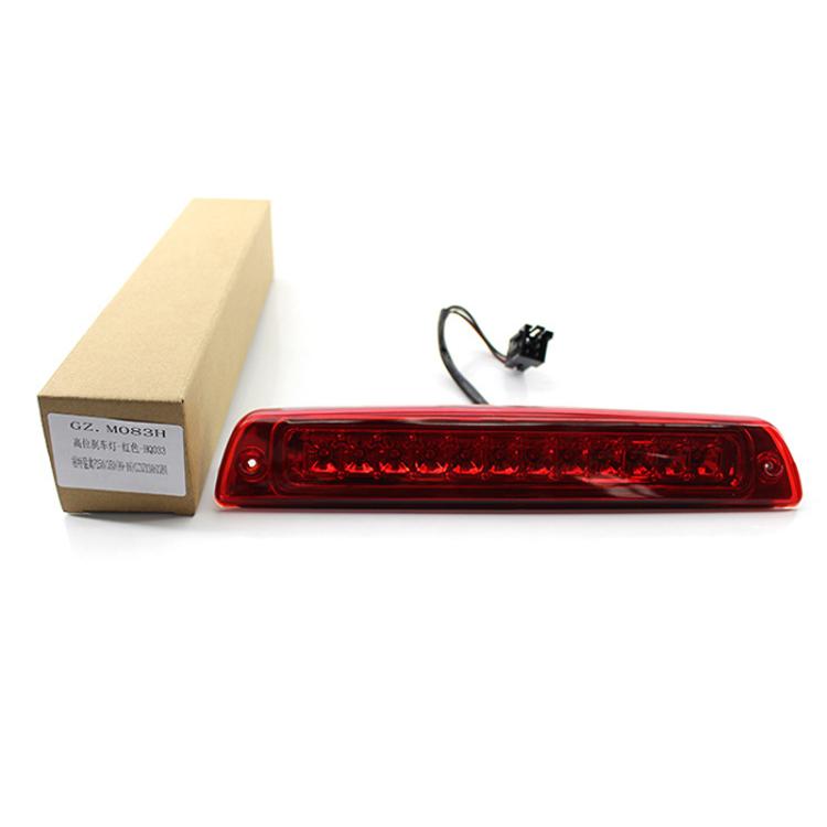 LED third brake light with red lens, black wiring lead, shown with retail box