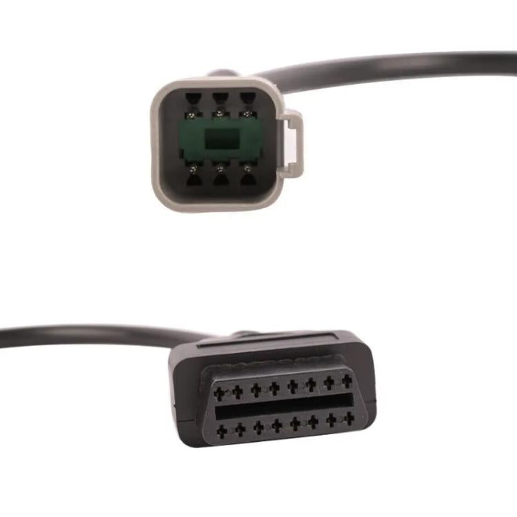 6-pin OBD cable close-up of keyed 6-pin socket and multi-pin diagnostic plug