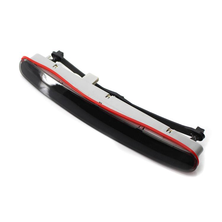 High mounted third brake light with red lens and black housing, rear mounting clips