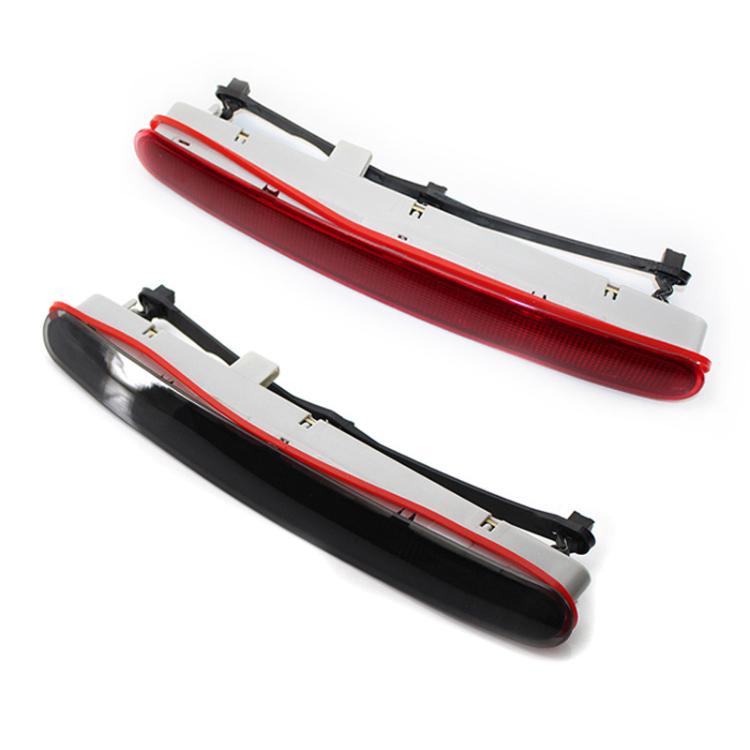 High mounted third brake light with red lens and black housing, mounting clips visible
