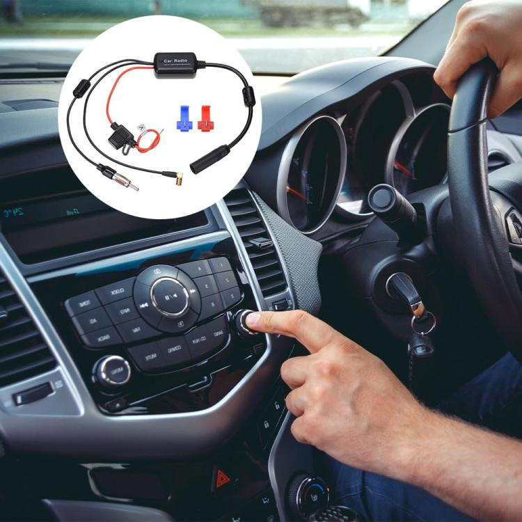 Car dashboard installation with antenna signal amplifier kit module and connected wiring.