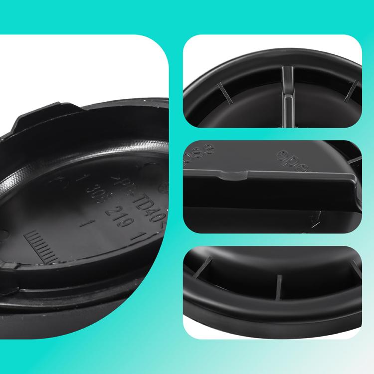 Headlight dust cover detail view, black cap with mounting tabs and vented rim