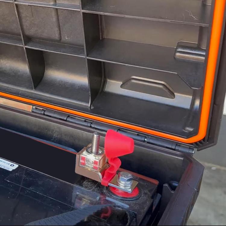 Ceramic fuse installed in fuse block, red cover and metal bolt terminal