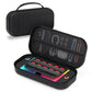 Black hard-shell game console carrying case with mesh front panel and open organizer tray