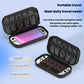 Black portable travel game console carrying case with mesh lid and accessory organizer tray