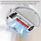 Robot vacuum underside showing red main brush roller assembly
