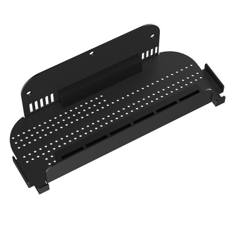 Black wall mount holder with perforated insert for storing game cards and Joy-Cons