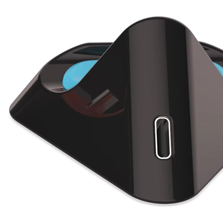Close-up of black charging dock with front charging port and colored inserts