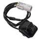 Reversing parking assist camera with black lens housing and white electrical connector