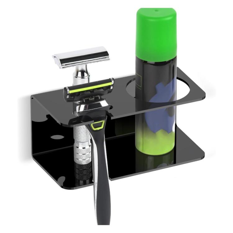 Black acrylic razor storage stand holding razors and a green bottle on wall mount